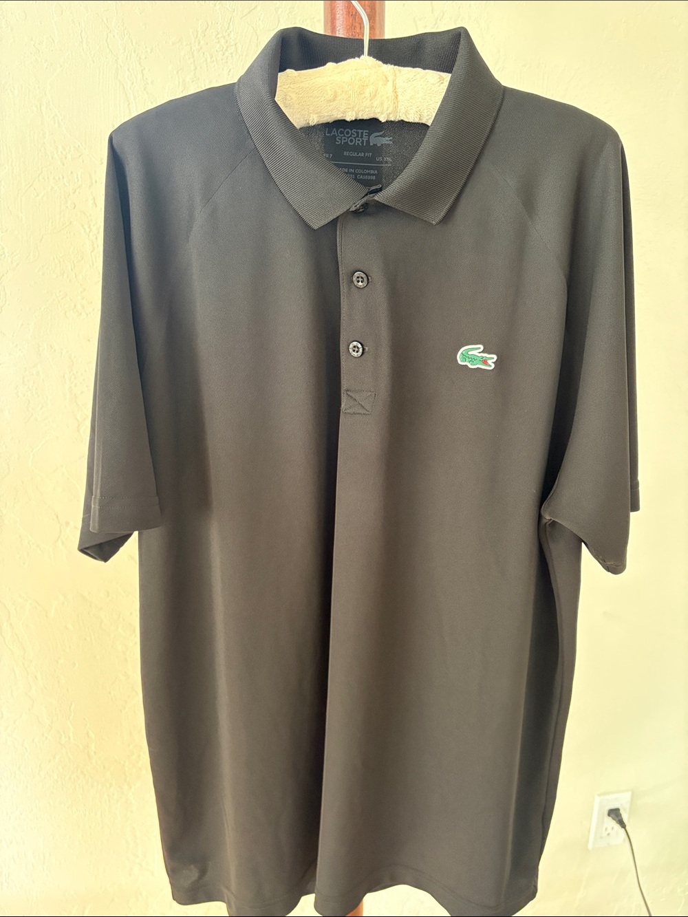Men’s Lacoste sport polo shirt.